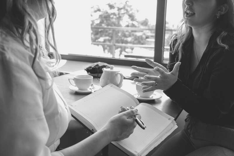 Woman Meeting with a Therapist  